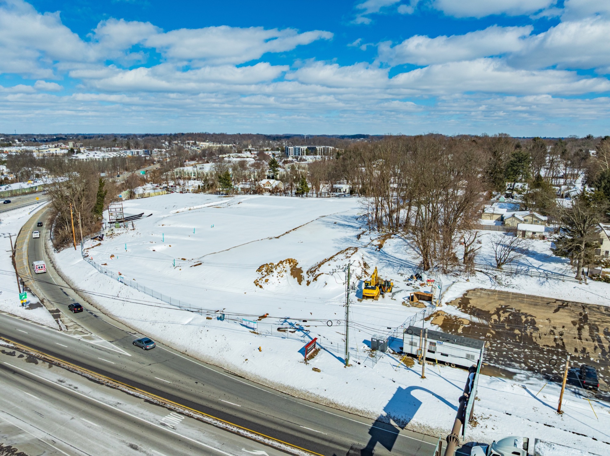 Snow-covered High Street construction site viewed from the southeast